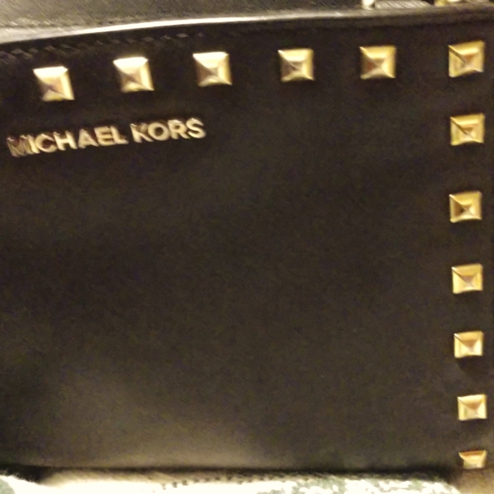 Michael Kore pures